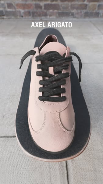 This ad shows a close up of the brand's shoe sitting on top of a skateboard.