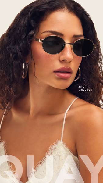 Image ad featuring a woman wearing Quay sunglasses.