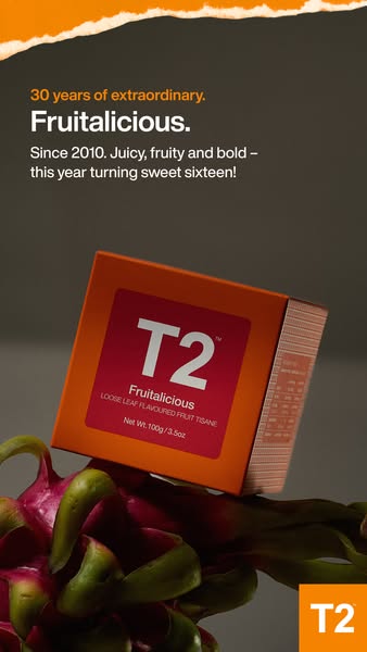 This ad promotes T2's Fruitalicious tea, emphasizing its blend of juicy and fruity flavors, and commemorating the br