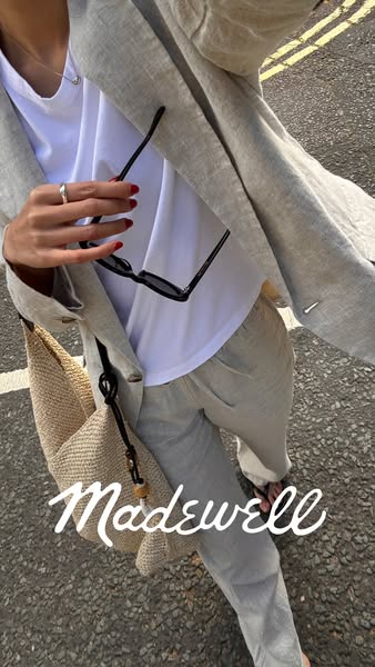 This ad for Madewell features a casually-dressed person on a city street wearing a blazer and linen pants from the brand