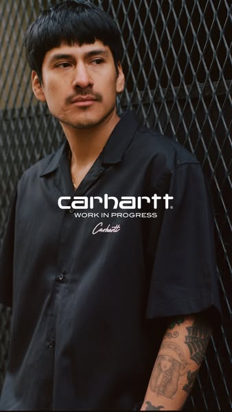 This ad features a man wearing a Carhartt shirt, showcasing the brand's clothing line.