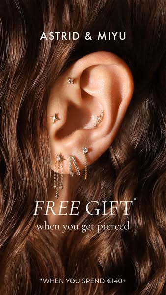 This image ad for Astrid & Miyu offers a free gift with piercing when you spend €140+.