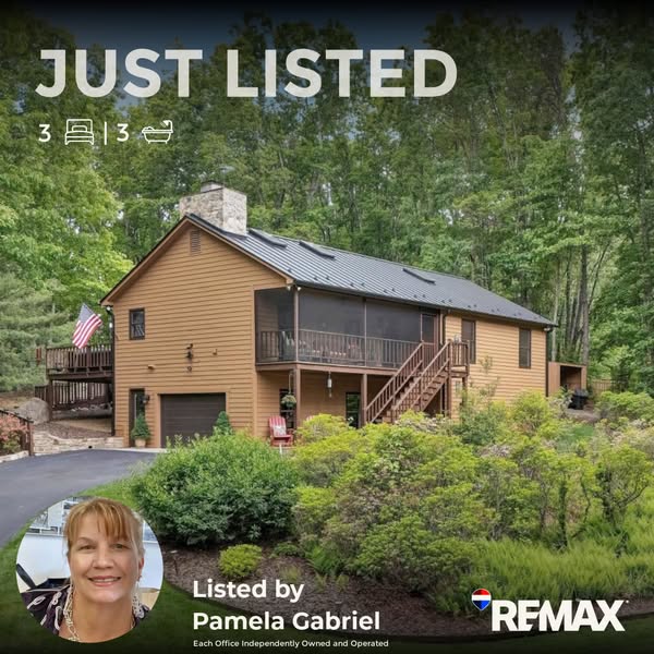 This ad is a photo of a house in the woods that has recently been listed by Pamela Gabriel with RE/MAX. The home has 3 b