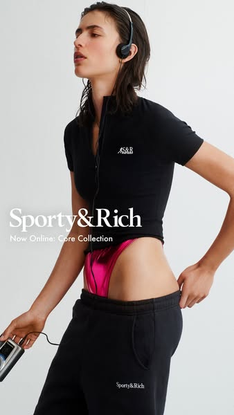 This image ad showcases Sporty & Rich apparel, featuring a model in a cropped black shirt, shiny pink bikini bottoms