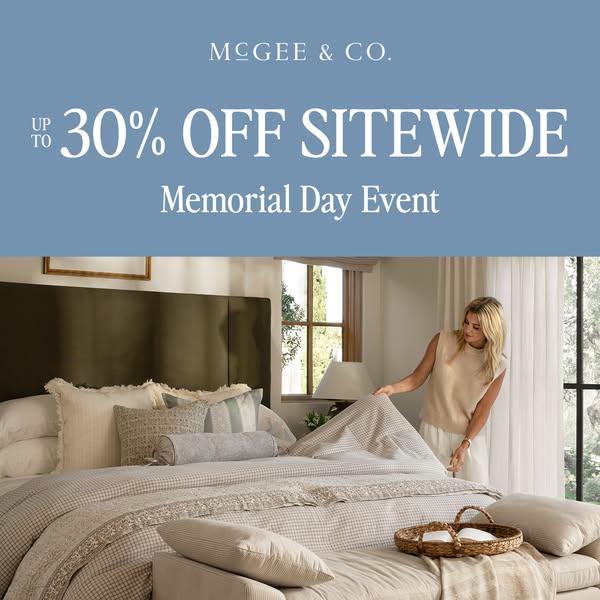 This ad promotes McGee & Co.'s Memorial Day event, offering up to 30% off sitewide. The image shows a neatly mad