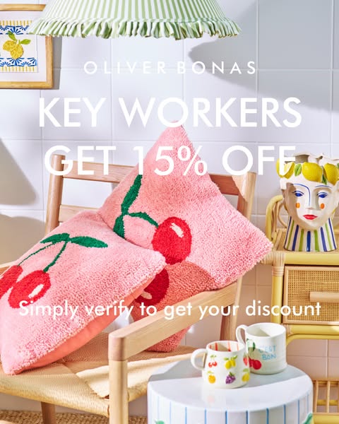 This image ad by Oliver Bonas offers 15% off to key workers. The ad features a cozy, inviting scene with cushions and mu