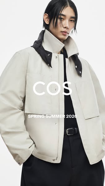 This ad is for COS. It is a product shot of a man wearing a jacket from the spring/summer 2026 collection. The COS logo 