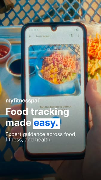 This ad for MyFitnessPal shows a phone screen using the app to scan a meal. The ad highlights the app's ability to m