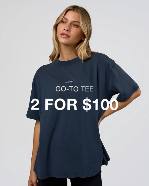 This ad features a woman wearing the LSXD brand Go-To Tee, which is being offered as a 2 for $100 deal.