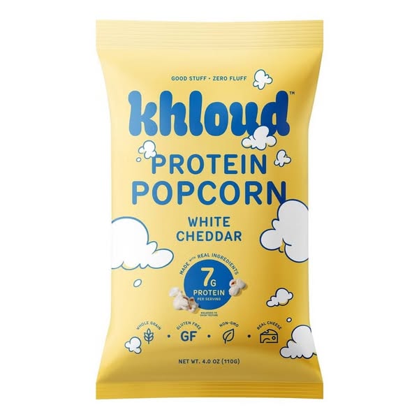 Image ad for Khloud Protein Popcorn in White Cheddar flavor. The ad displays a full bag of the protein popcorn surrounde