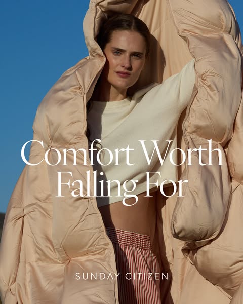 This ad for Sunday Citizen features a woman wrapped in a peach-colored comforter, with text that highlights the comfort 