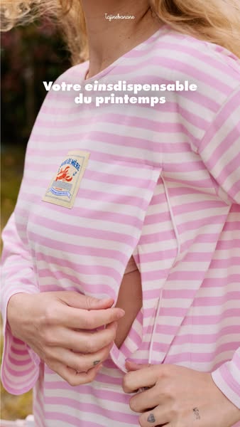 This ad features a woman wearing a pink-and-white striped shirt that has an opening for breastfeeding, implying it is a 