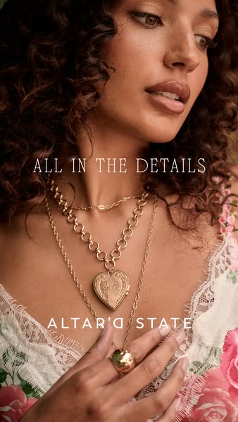 This image ad showcases gold jewelry from Altar'd State. The model is wearing three necklaces of varying lengths and