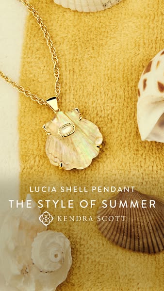 This ad for Kendra Scott's Lucia Shell Pendant uses a high-angle shot of the necklace laid among seashells to create