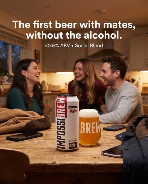This ad features a can of alcohol-free beer alongside a pint glass of the beer and three friends sitting at a table enjo