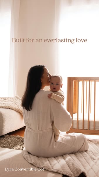 This ad features a woman holding a baby next to a crib. The ad promotes the Lyra Convertible Cot, emphasizing its role i