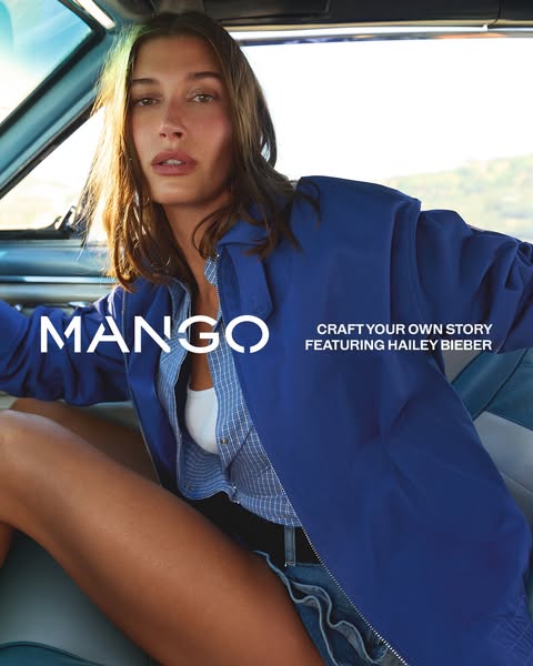 This ad for Mango features Hailey Bieber wearing a Mango jacket and sitting in a vintage car. The ad is focused on a you
