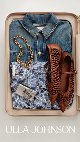 This ad showcases Ulla Johnson's clothing and accessories inside a suitcase. It is a flatlay composition that implie