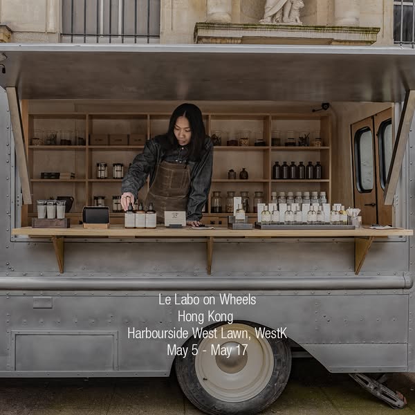This image ad promotes a Le Labo pop-up event in Hong Kong, showcasing their mobile perfume lab.