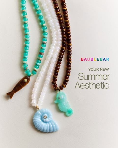 An image ad featuring three beaded Baublebar necklaces of varying colors and pendants.