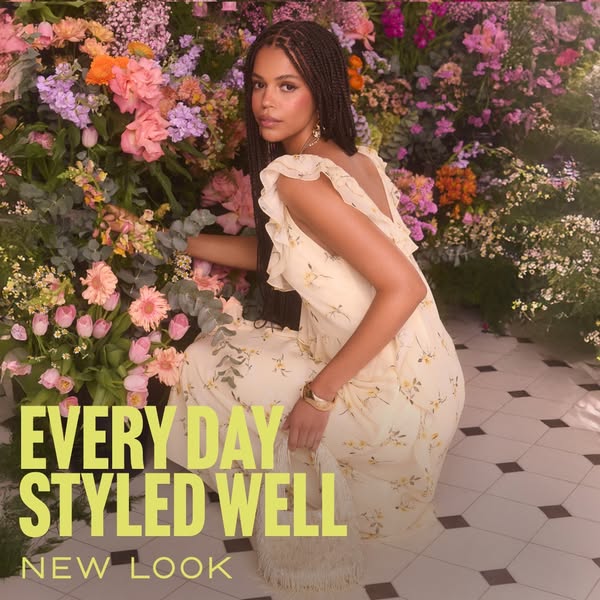 This ad for New Look features a woman posing amongst flowers to promote their clothing. The ad's text says, "Ev