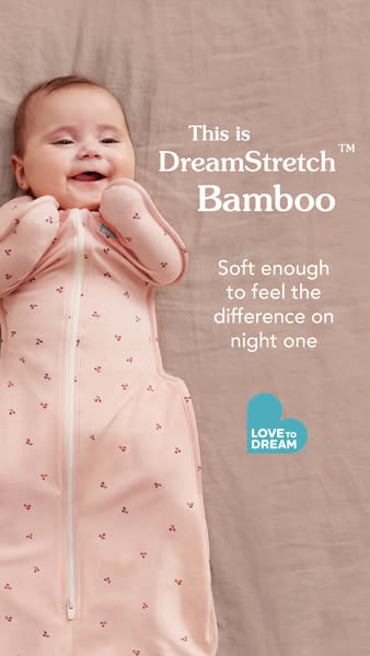 A close-up studio shot of an infant, presented to highlight the softness and comfort of a bamboo sleep suit designed by 