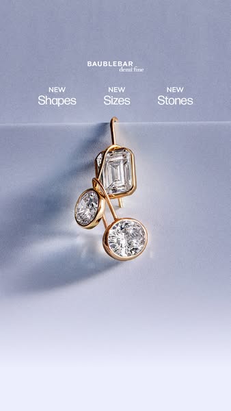 This Meta image ad showcases a close-up of a BaubleBar earring featuring new stone shapes, sizes and stones on a backgro