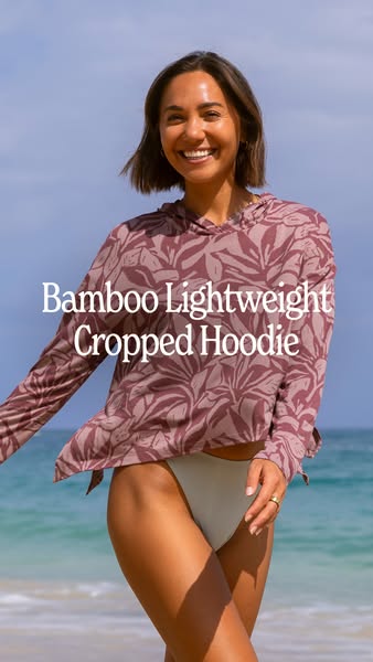 This ad showcases the brand's lightweight cropped hoodie being worn at the beach.