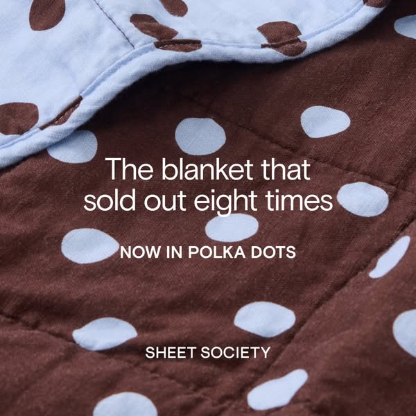 This image ad for Sheet Society features a close-up shot of a blanket with polka dots and promotes that this blanket sol