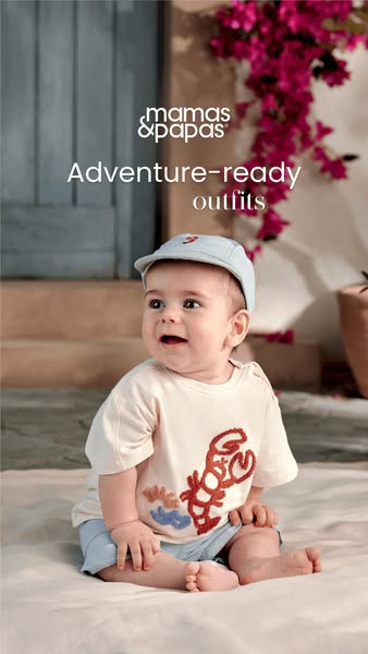 This ad by Mamas & Papas promotes adventure-ready outfits for babies. The image features a baby wearing a light-colo