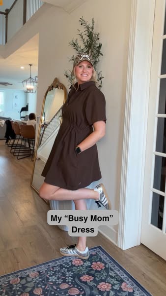 A woman promotes a dress that she calls her "Busy Mom" dress while standing in a house.