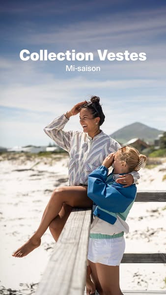 This image ad showcases a collection of jackets for mid-season wear, featuring two women on a boardwalk overlooking a be