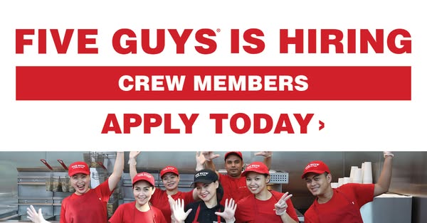 This image ad for Five Guys advertises job openings for crew members. It features a group of smiling employees in unifor