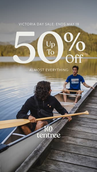 An ad promoting a sale from tentree, an apparel company, featuring two men in a canoe on a lake.