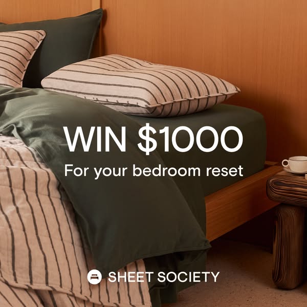 This ad by Sheet Society promotes a sweepstakes with a grand prize of $1000 for a bedroom reset. It features a cozy, inv