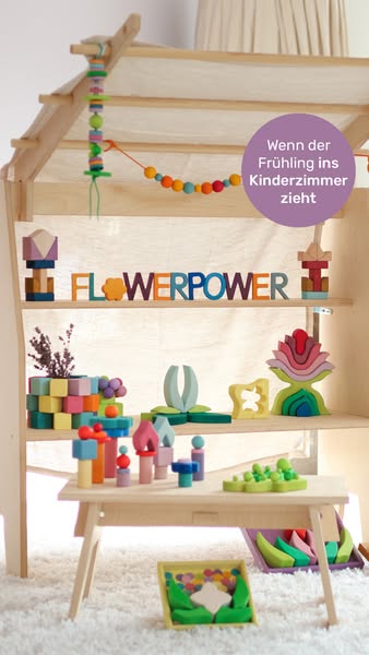 This ad promotes a variety of wooden toys from a brand called 'flowerpower'. The ad features a shelf with a play