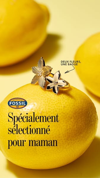 This image ad features a close-up shot of two gold flower-shaped rings resting on a lemon against a yellow background. T