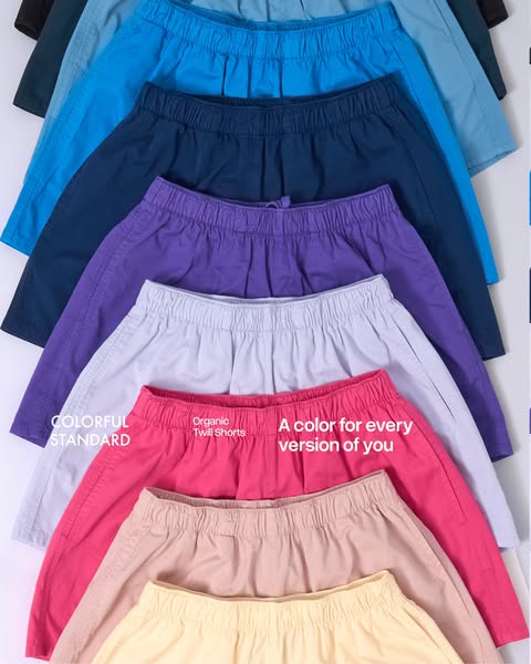An image ad showcasing a variety of COLORFUL STANDARD Organic Twill Shorts in different colors.