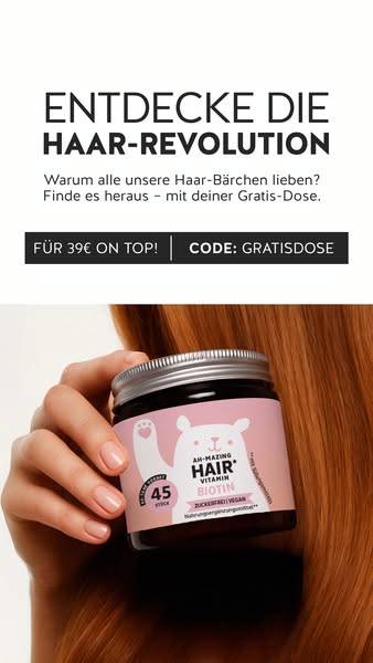 This image ad promotes AH-MAZING HAIR* VITAMIN BIOTIN hair vitamins, highlighting the product and a promotional offer fo