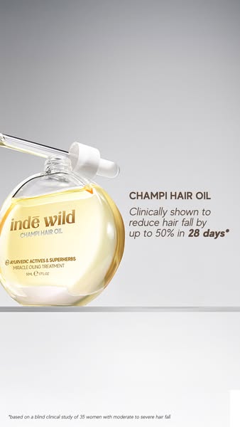This ad features a bottle of Inde Wild Champi Hair Oil and touts its clinical effectiveness in reducing hair fall by up 