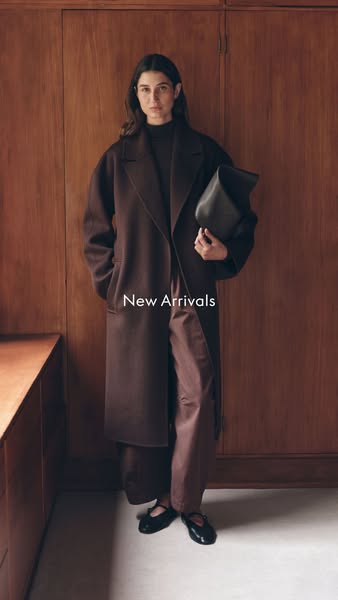 This ad features a person wearing items from a brand's new arrivals. The model is posed in front of a wood paneled w
