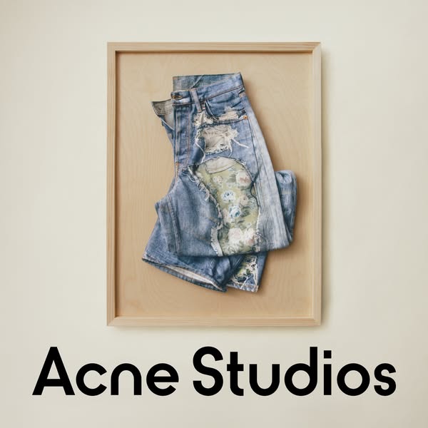 This ad for Acne Studios features an image of a pair of their denim jeans displayed in an artful setting, suggesting hig