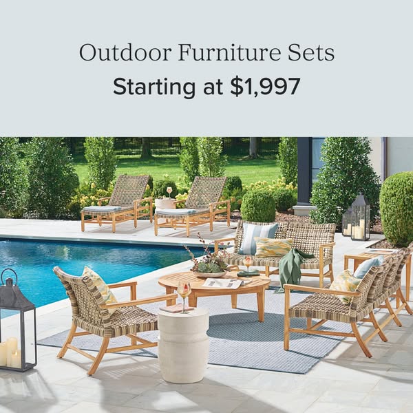 This image ad features a luxurious outdoor furniture set arranged around a pool, inviting viewers to imagine relaxing in