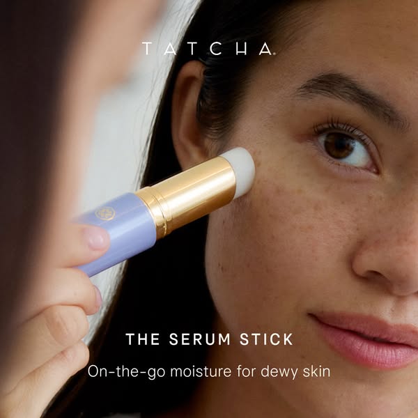 This ad showcases Tatcha's Serum Stick being applied to a woman's face, emphasizing its convenience for on-the-g