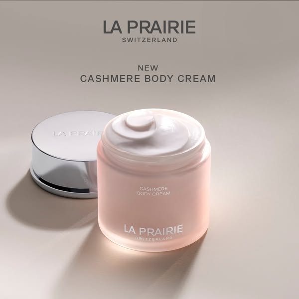 This ad showcases La Prairie's new Cashmere Body Cream. It uses a minimalist, high-end aesthetic to emphasize the pr