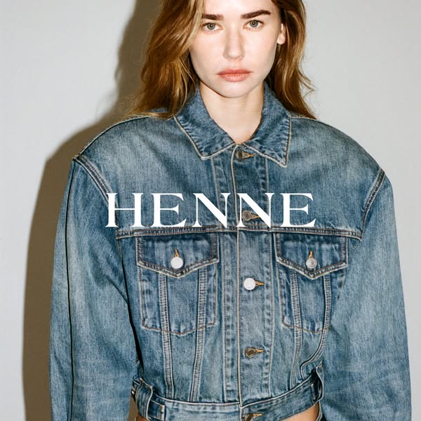 This ad features a woman in a denim jacket. The brand's name is displayed in the middle of the image.