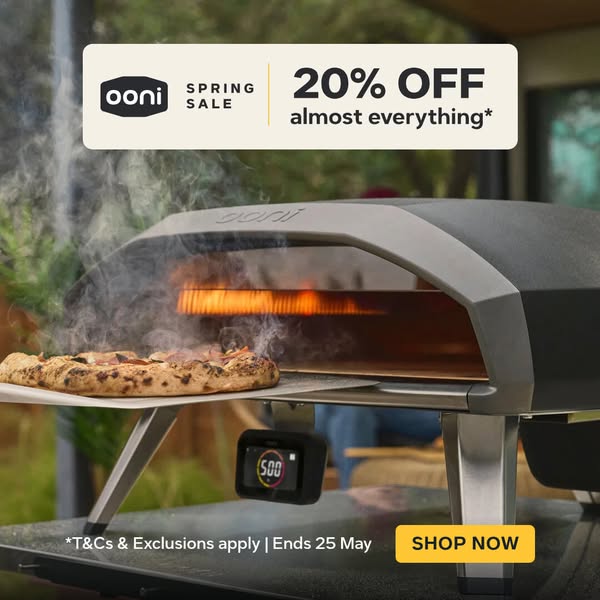 This ad is for Ooni pizza ovens. It showcases the pizza oven in use, with a pizza in the oven, and features a 20% off sa