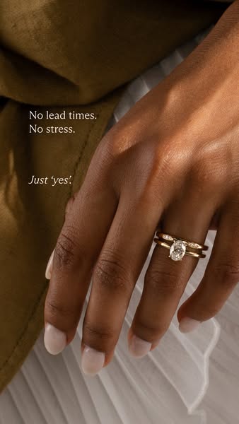 An ad showcasing two gold rings worn on a woman's finger with the promise of no lead times or stress, only a 'ye