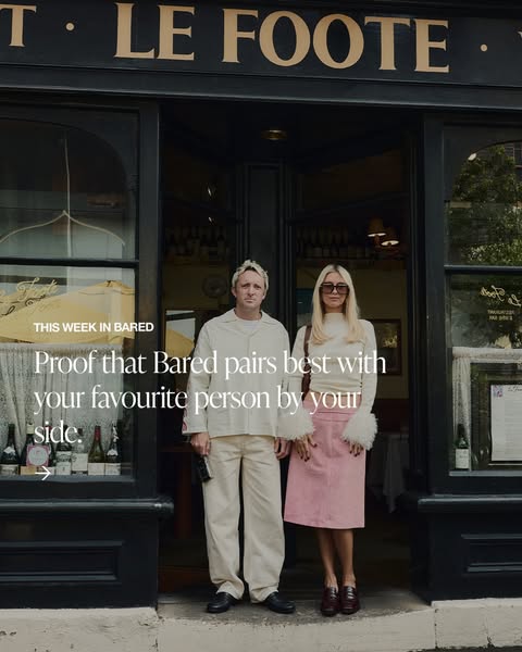 This image ad features a couple posing outside of a building to showcase the Bared brand of shoes and how well it pairs 