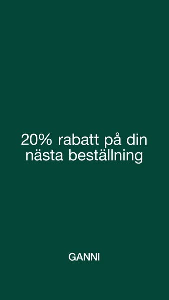 This ad for GANNI offers 20% off the next order. The ad features a solid dark green background with white text.